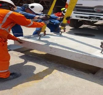 Crew repairing a concrete slab