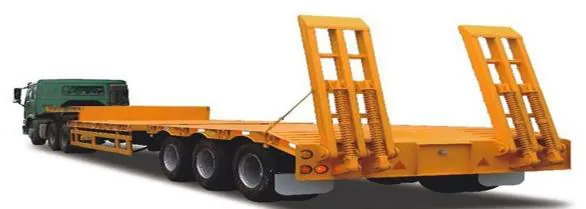 Low-bed trailer for heavy equipment transport