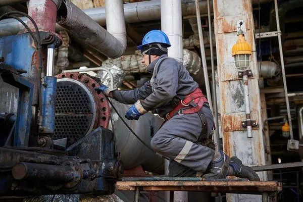 Technician working at a heat exchanger