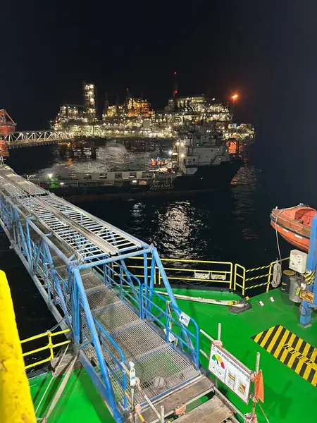 Offshore platform and gangway at night