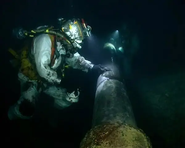 Diver working on a subsea pipeline