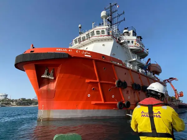 Orange offshore support vessel at sea