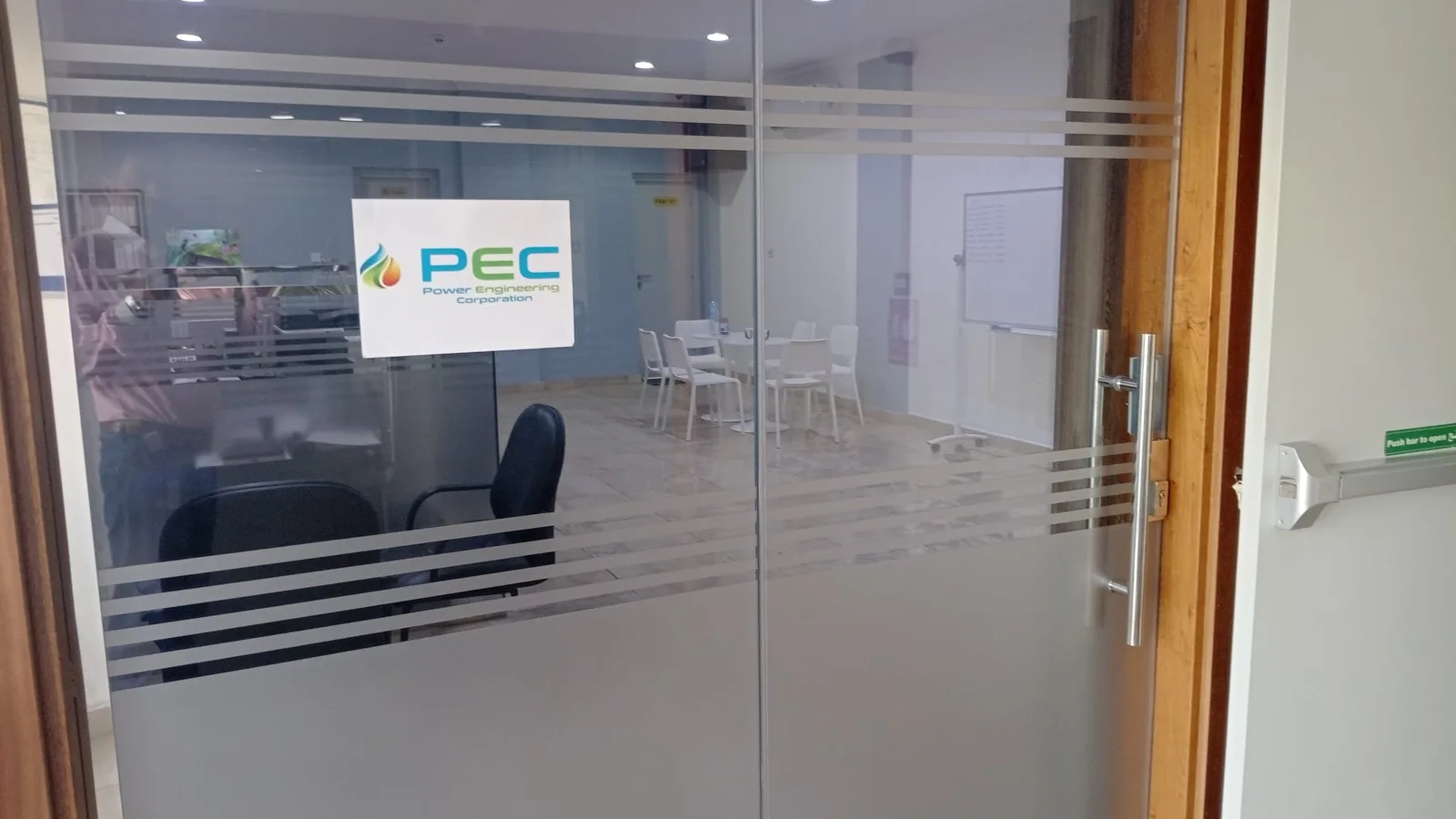 Glass entrance to the PEC office at the workshop